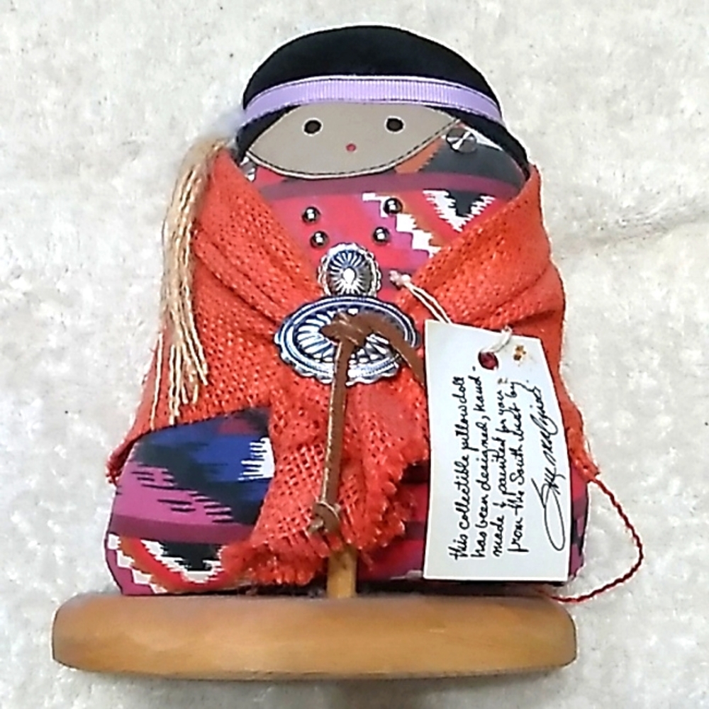 Wini doll by Sue Malinski. Doll is 7" height. Wooden base is 6" x 3.5".